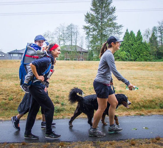 Family and dog doing the coquitlam crunch