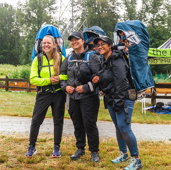 3 participants in the recreational category of the coquitlam crunch challenge with their babies on their backs
